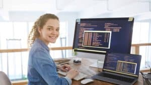 female developer checking a site as part of a website maintenance plan