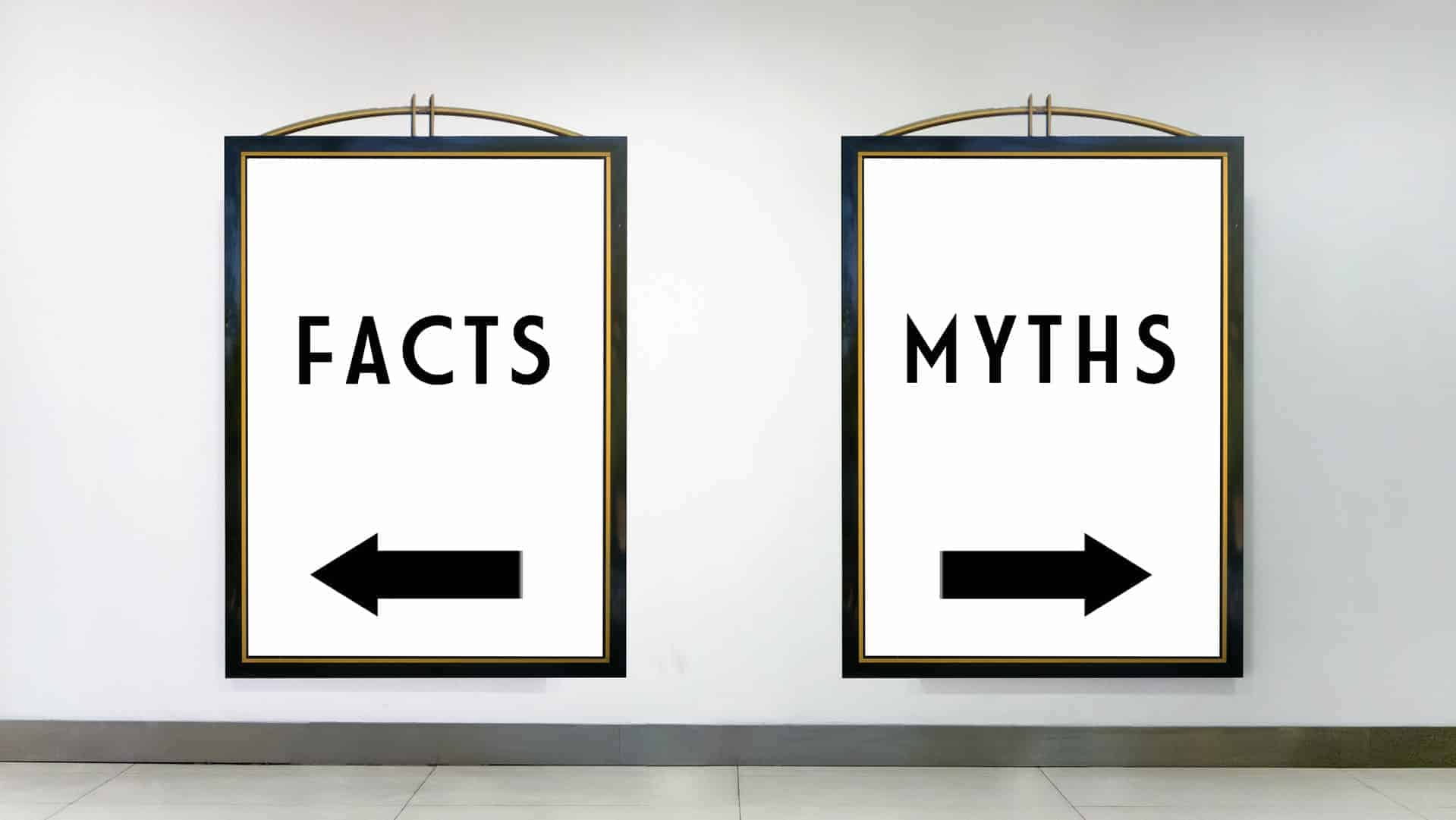 two-signs-with-arrow-pointing-opposite-directions-reading-facts-and-myths